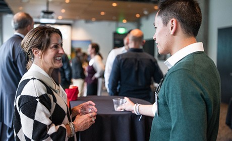 Mentor and student at event