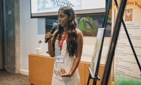 Photo of student at undergraduate research conference