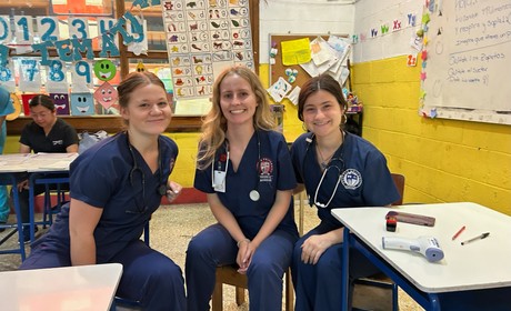 Three nursing students in a classroom