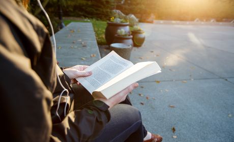 Student holding book