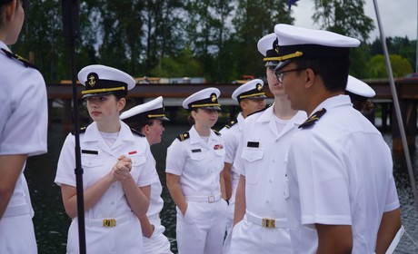 NROTC students in uniform on a sailboat