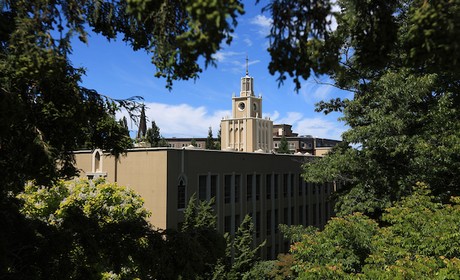 A photo of the Administration Building through trees