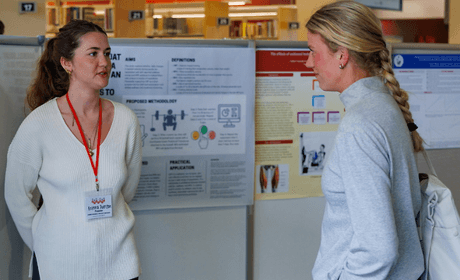 Student presenting at research conference