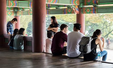 People sitting at a temple