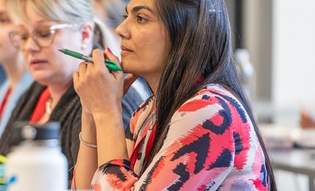 A professional listening to a discussion