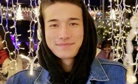 a man in front of lights