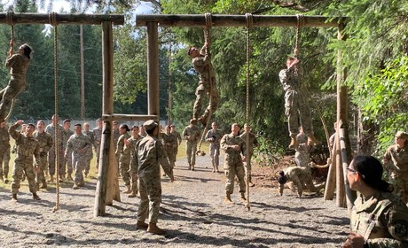 Cadets running obstacle course