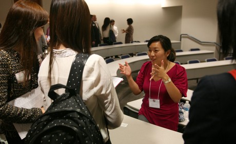 Mentor speaking to students