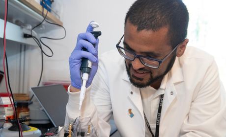 Dr. Chris Whidbey using advanced lab equipment