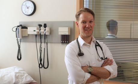 A person in a clinical setting with a stethoscope