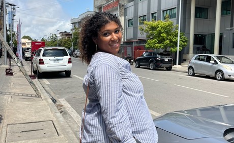 a woman standing on a street