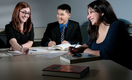 Students studying and laughing