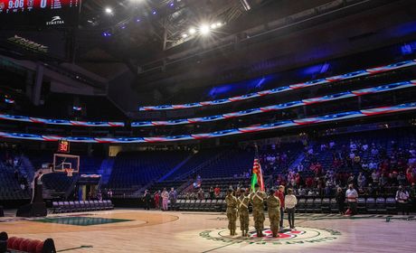 Color guard presents flags at Climate Pledge Arena