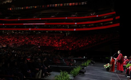 President Peñalver on stage inside the Climate Pledge Arena
