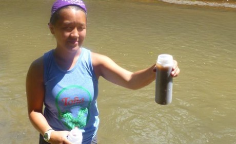Student Collects Water Sample