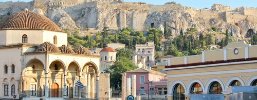 Greek town square with the Acropolis in the background on a hill