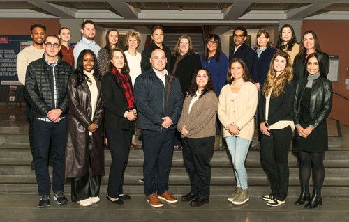 A group of professionals posing for a photo