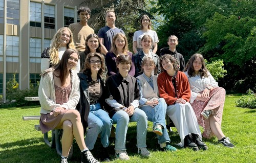 The Seattle University Undergraduate Research Journal (SUURJ) student staff outside on the Seattle University campus