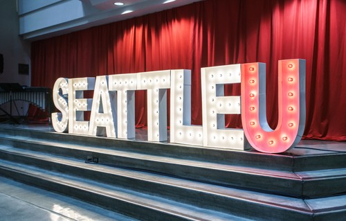 Light up sign that says Seattle U