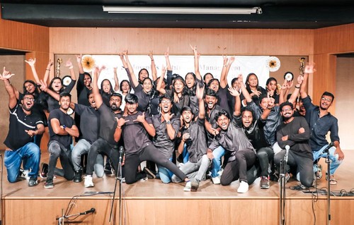 SJIM students on a stage