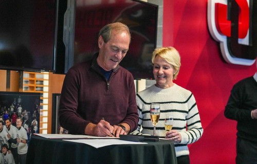 Arnold couple signing endowment