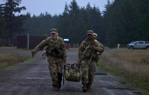 Cadets carrying weighted stretcher