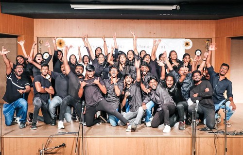 SJIM students on a stage