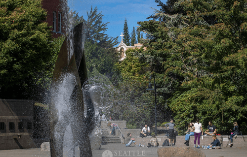 View of the quad and fountain with students