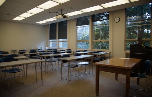 An empty classroom with desks
