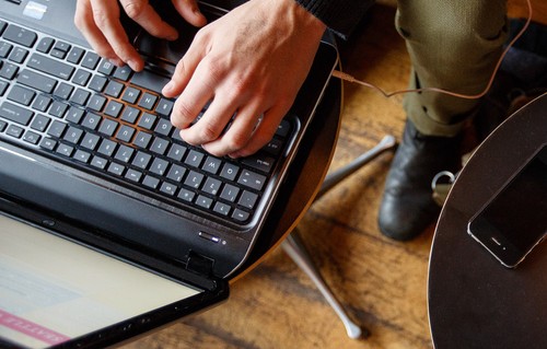 A student using a laptop