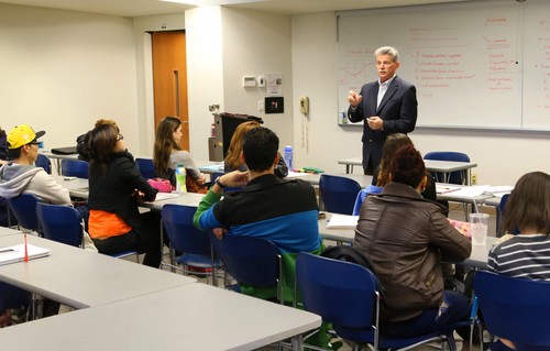 A guest lecturer at an Albers classroom