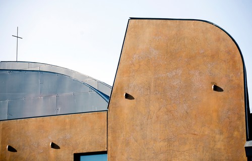 A building with a curved roof.