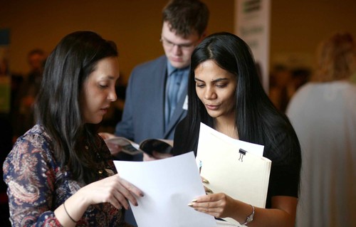 Career engagement experts review a resume