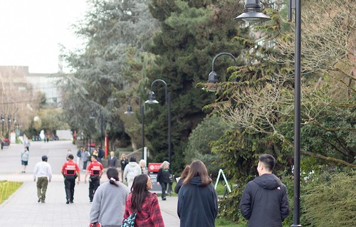Students walking across campus during Earth Month.