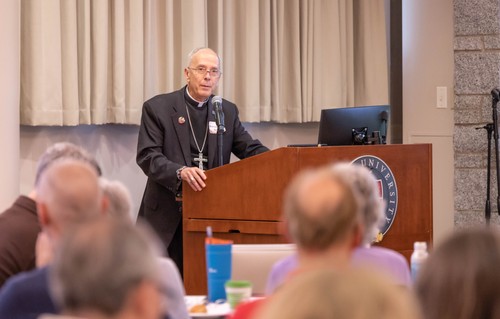 Immigration summit Bishop speaking