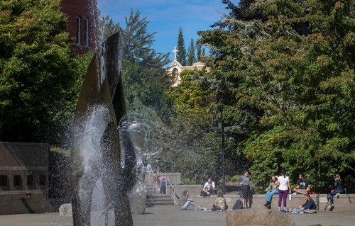 A statue of a man in a park.