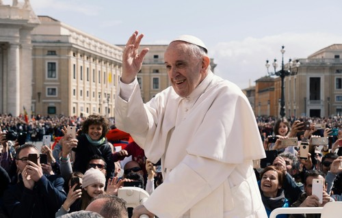 Pope Francis with people at Vatican