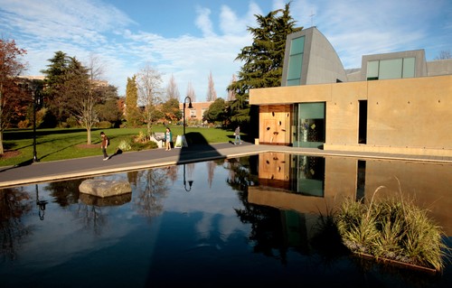 A building with a pool of water.
