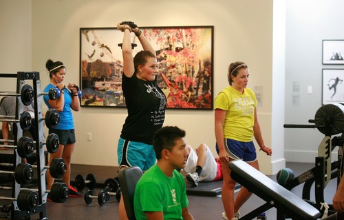 A group of people in a gym.