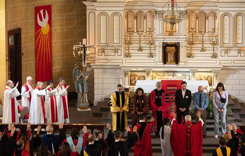 SU's newest administrators receive a special blessing during the university's Mass of the Holy Spirit.