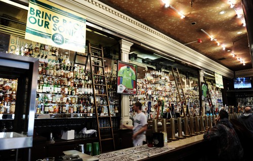 A view of a bar packed with liquor bottles