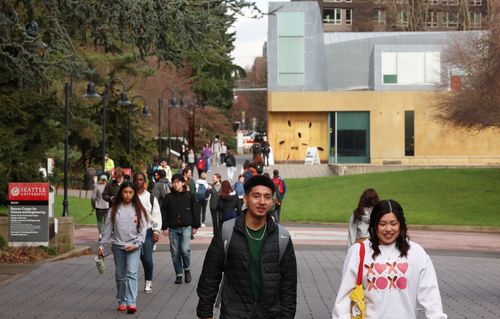 Students walking on campus in winter
