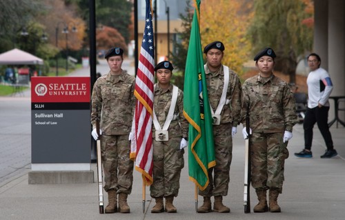 A group of soldiers holding flags.