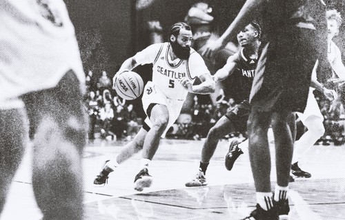 A photograph of Cameron Tyson playing basketball