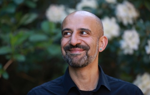 A portrait of Onur Bakiner