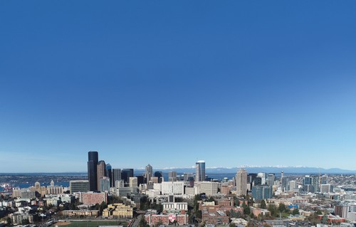 A city with buildings and blue sky.
