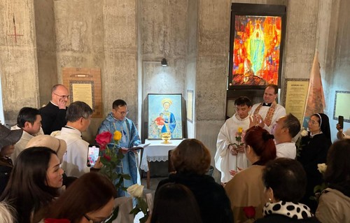 Trung Pham in chapel with art