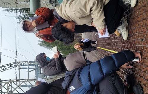CEE 24.2 6 civil engineering students working on a bridge