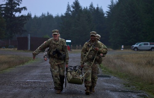 Cadets carrying weighted stretcher