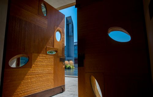 Doors of St. Ignatius Chapel looking out to the bell tower